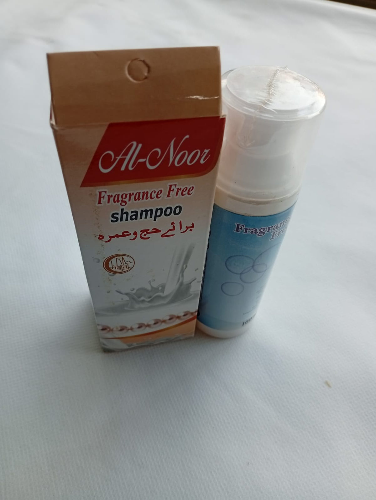 Al Shaheen  Fragrance Free shampoo box and bottle on a white background